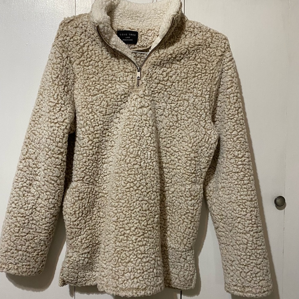 Soft, cozy 1/4 zip pullover with pockets
